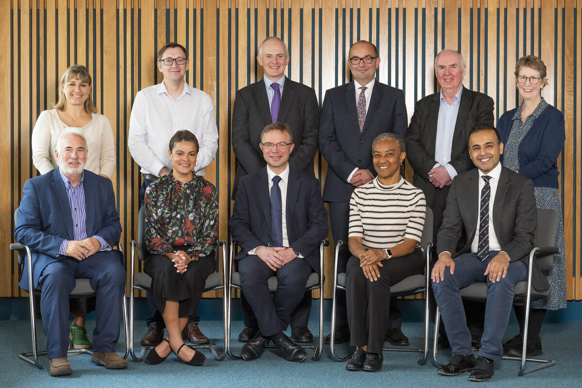 A group portrait of the RCR trustees for autumn 2025, five people standing and sitting 